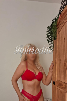British Blonde escort Tegan is 5’1 height 