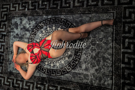 Blonde escort Alex is 5’4 height